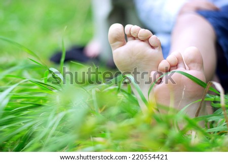 Little feet on the grass