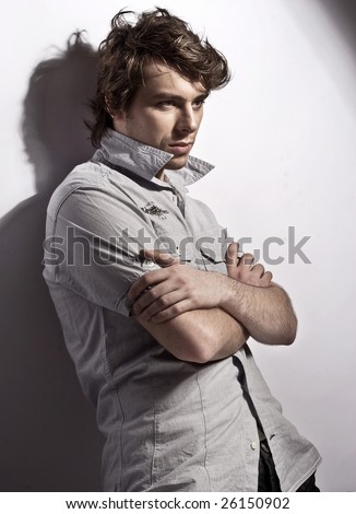 pictures of handsome man. stock photo : young, handsome man thinking