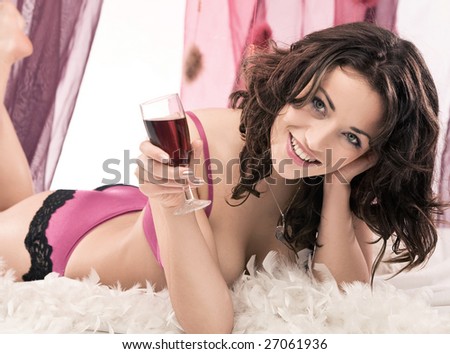 Beautiful woman with glass wine