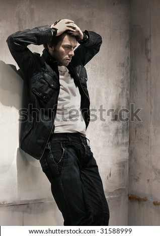 SaaaaD Boys Stock-photo-sad-man-standing-at-wall-31588999