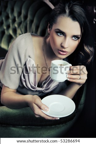 صور لتصميم ستايل كافيه بنات عاجل Stock-photo-young-beautiful-lady-drinking-coffee-53286694