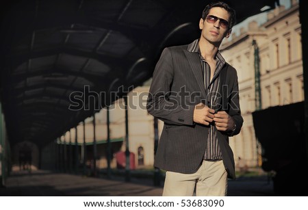 Fashion style photo of an handsome elegant man