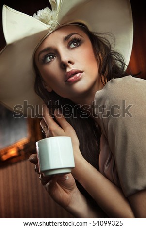 woman sipping coffee