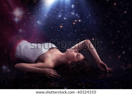 stock photo : Sensual lady laying over romantic background