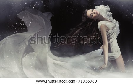 stock photo : Young woman wearing gorgeous white dress