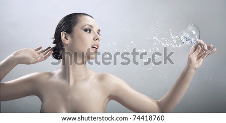 Splashing water on woman