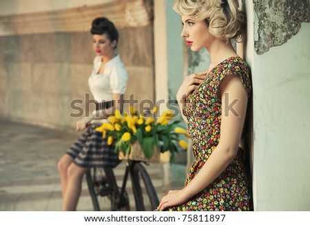 Fashion style photo of a gorgeous women wearing retro clothes