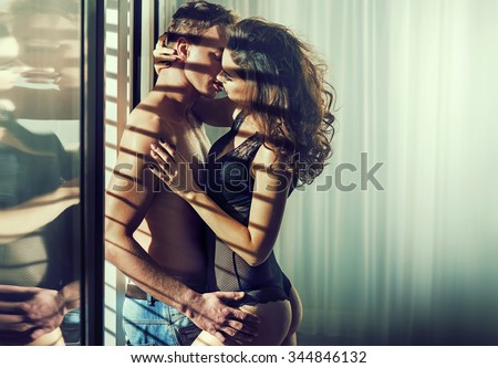 Sexy young couple hugging