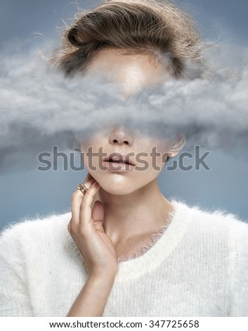 Young model with head in the clouds