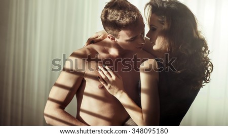 A sexy young topless couple