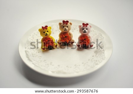 sweet candies of three bears food isolated on white