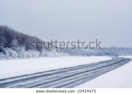Winter road in distant Russia on which much dangerously go