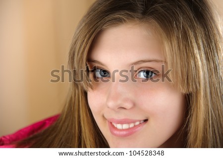 Close-up portrait of a attractive girl. Youth, beauty and health.