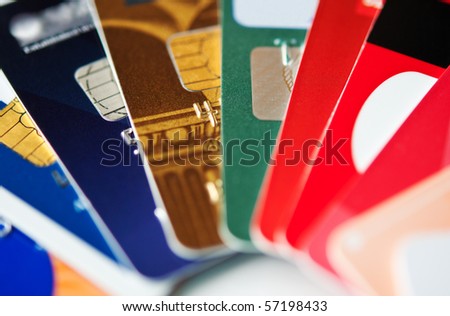 stack colorful plastic credit cards, closeup, selective focus