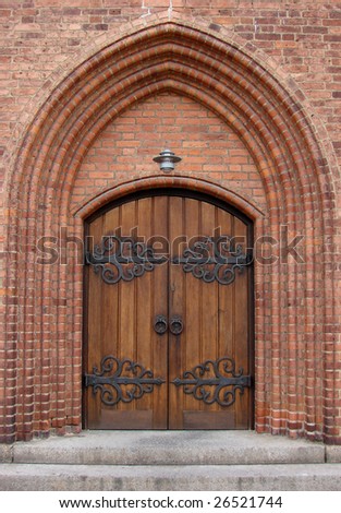 large oak door of a church