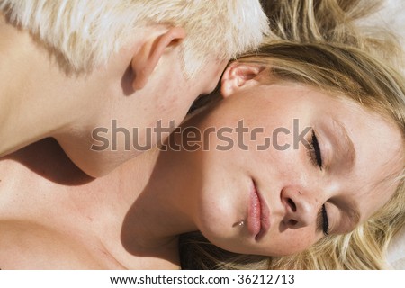 Two girls making out in the sun