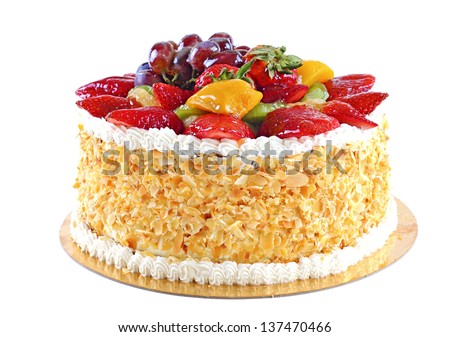 Tasty and beautiful decorated cake with fruits, isolated on white background