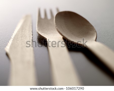 closeup of wooden disposable cutlery