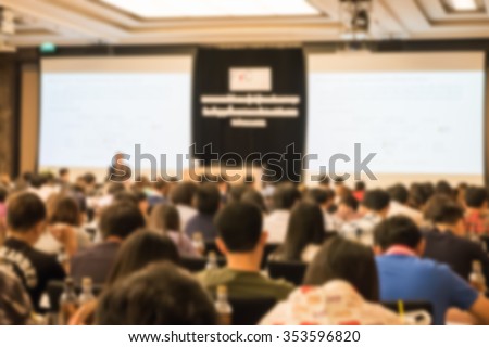 Motion blur of view of seminar with audience in a seminar room