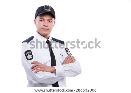 Armed security guard posing isolated on white background.