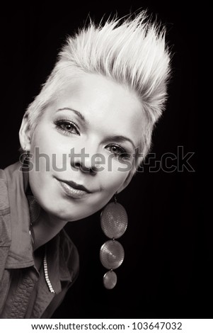 beautiful woman portrait against black background - black and white