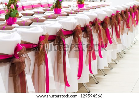 wedding chairs with silk ribbons