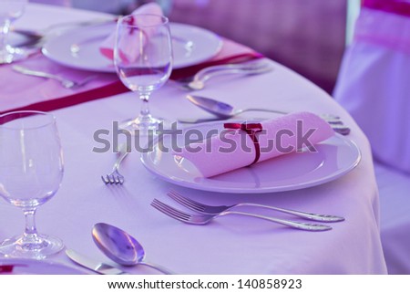 luxury place setting, purple napkin on plate - purple light decoration
