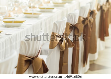 wedding chairs with silk ribbon