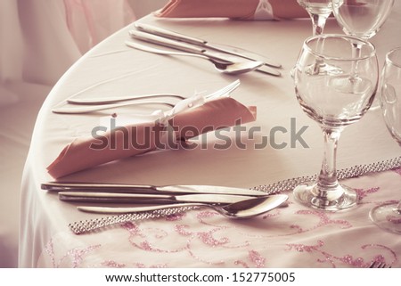 cutlery and napkin on the wedding table - colorized photo