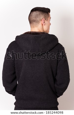 black jacket with hood on a young man
