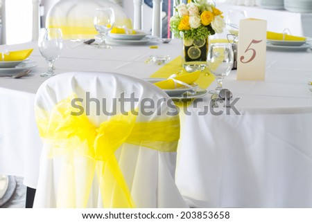 yellow and white wedding table decoration