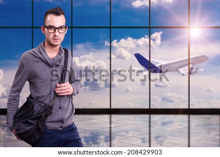 young man at airport, late airplane