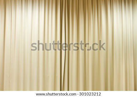closed curtain with light spots in a theater