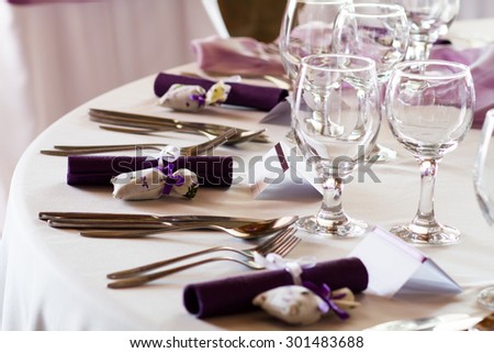 elegant restaurant table set for event, wedding place