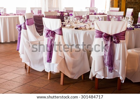 wedding chairs with ribbon, event place
