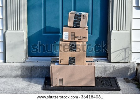 MARYLAND, USA - January 18, 2016: Image of an Amazon package. Amazon is the largest Internet-based retailer in the United States.