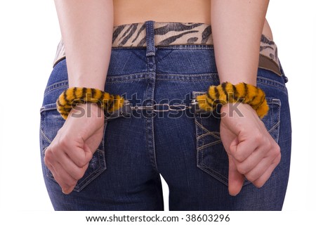 stock photo Close up of a girls hand in handcuffs Woman's hands