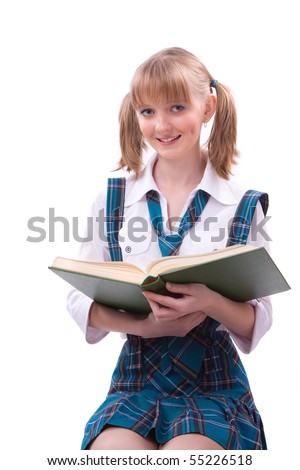 Senior high school student in uniform with documents is sitting on the stack of book. Young and beautiful schoolgirl  is wearing a traditional uniform is reading textbook.