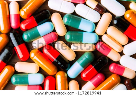 Drug prescription for treatment medication. Pharmaceutical medicament, cure in container for health. Pharmacy theme, capsule pills with medicine antibiotic in packages.closeup,Medicine or capsules.