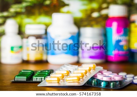 Drug prescription for treatment medication. Pharmaceutical medicament, cure in container for health. Pharmacy theme, capsule pills with medicine antibiotic in packages.