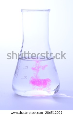 chemical reaction in laboratory flask