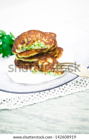 Zucchini Pancake Served with Sour Cream