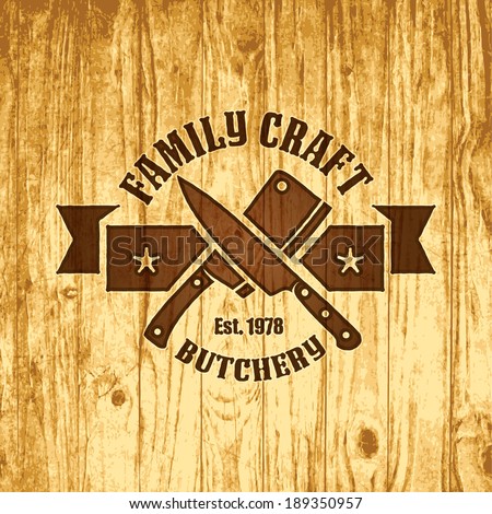 Retro styled label of butcher meat shop scorched on wood Retro styled label of butcher meat shop scorched on wood