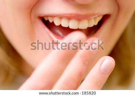 Smiling Woman and honey on the lips