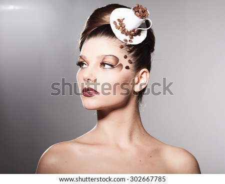 girl in a hat stylized cup of coffee with coffee beans on the face