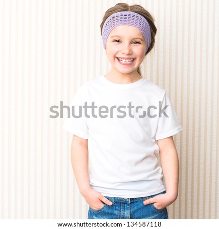 Cute Smiling Little Girl In White T-Shirt