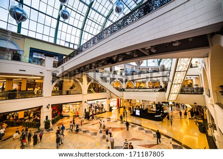 DUBAI, UAE - DECEMBER 19: Shoppers at Mall of the Emirates on December 19, 2013 in Dubai. Mall of the Emirates is a shopping mall before christmas in the Al Barsha district of Dubai.
