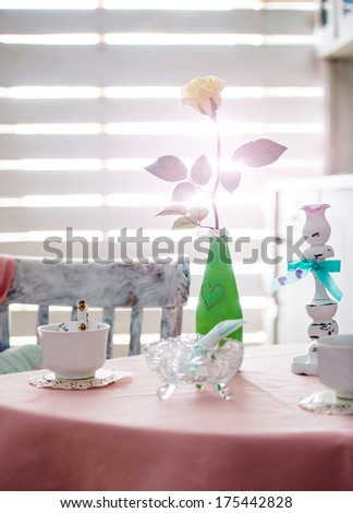 romantic table for Valentine\'s Day with rose on table