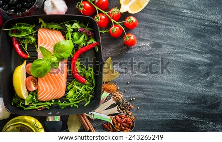 raw red fish with vegetables