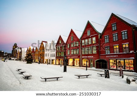 Bergen, Norway - December 27, 2014: Famous Bryggen street with wooden colored houses in Bergen at Christmas, Norway